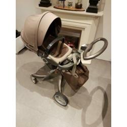 Stokke reiswieg en buggy met luiertas.