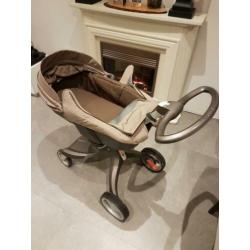 Stokke reiswieg en buggy met luiertas.