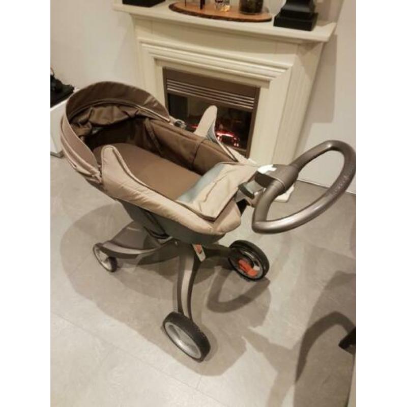 Stokke reiswieg en buggy met luiertas.