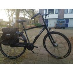 Tekoop zwarte Gezelle herenfiets. +_ 50 Kilometer op gefie