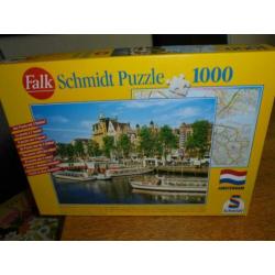 4 puzzels voor 10 euro plus 1 gratis.