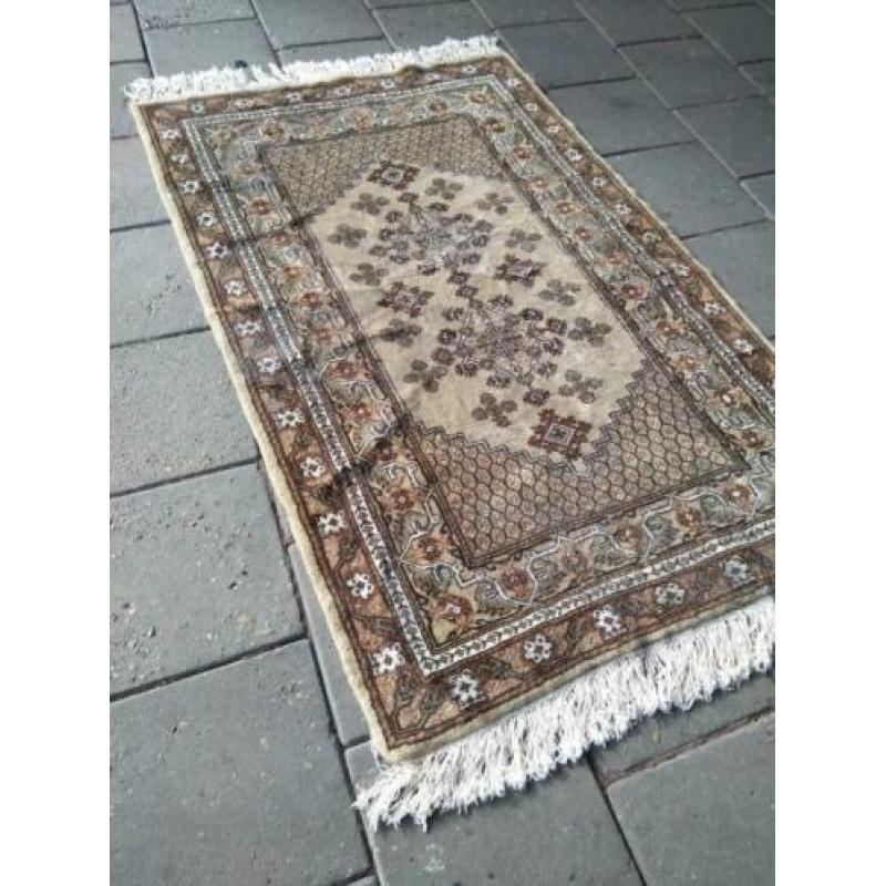 Vintage perzisch tapijt 140x60 cm.