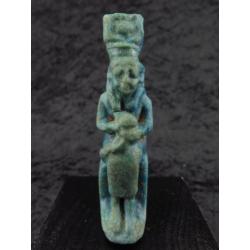 Egyptian faience amulet of Isis with Horus in her lap