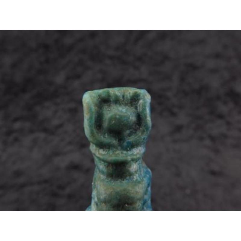 Egyptian faience amulet of Isis with Horus in her lap