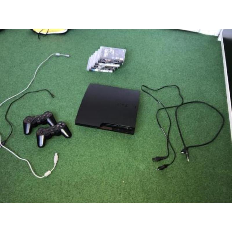 Playstation 3 met 2 controllers en 6 spellen